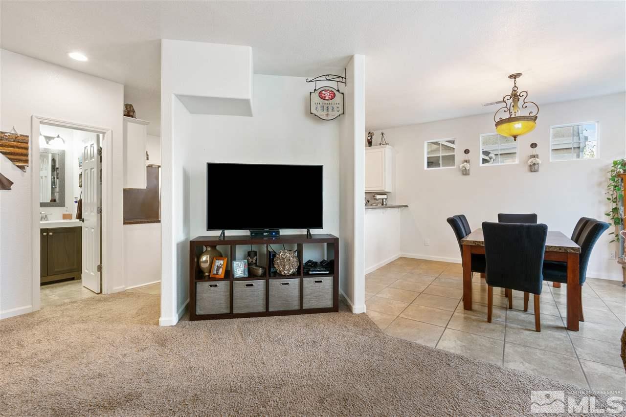1859 Resistol Drive Reno, NV 89521 - Photo 6 of 33 a living room with furniture and a flat screen tv