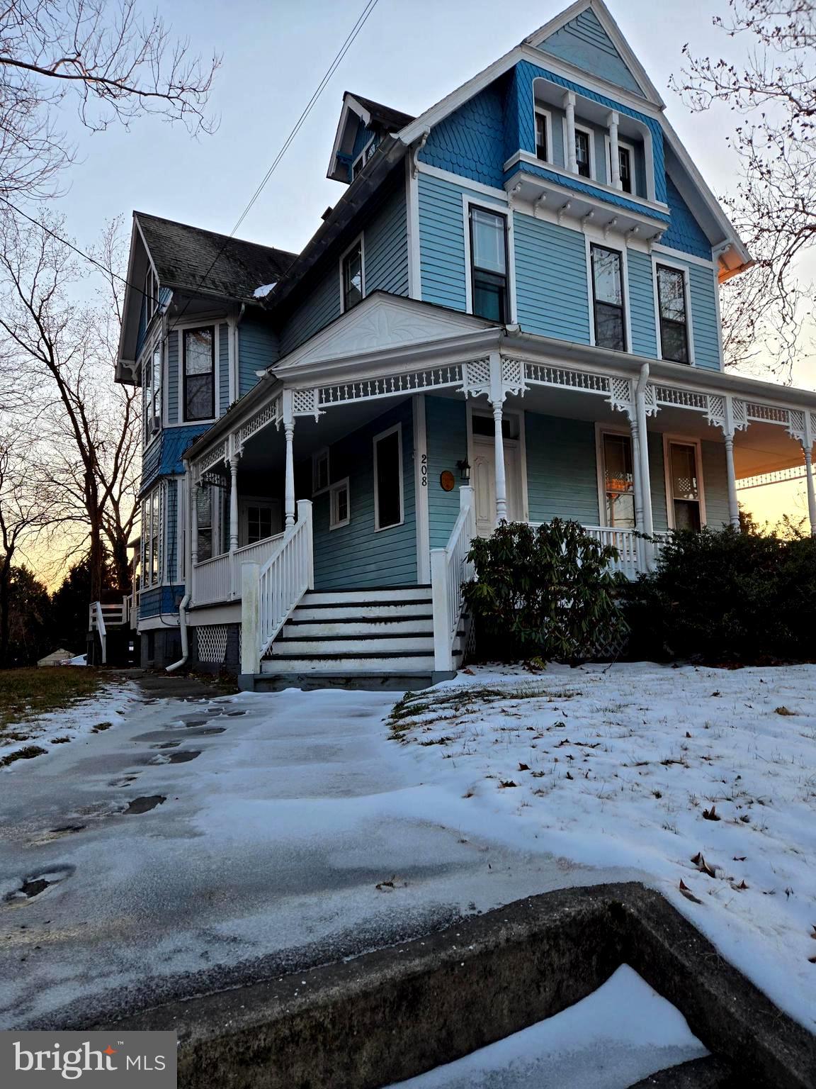 208 West Isabella Street Salisbury, MD 21801 - Photo 12 of 14 a front view of a house with garden