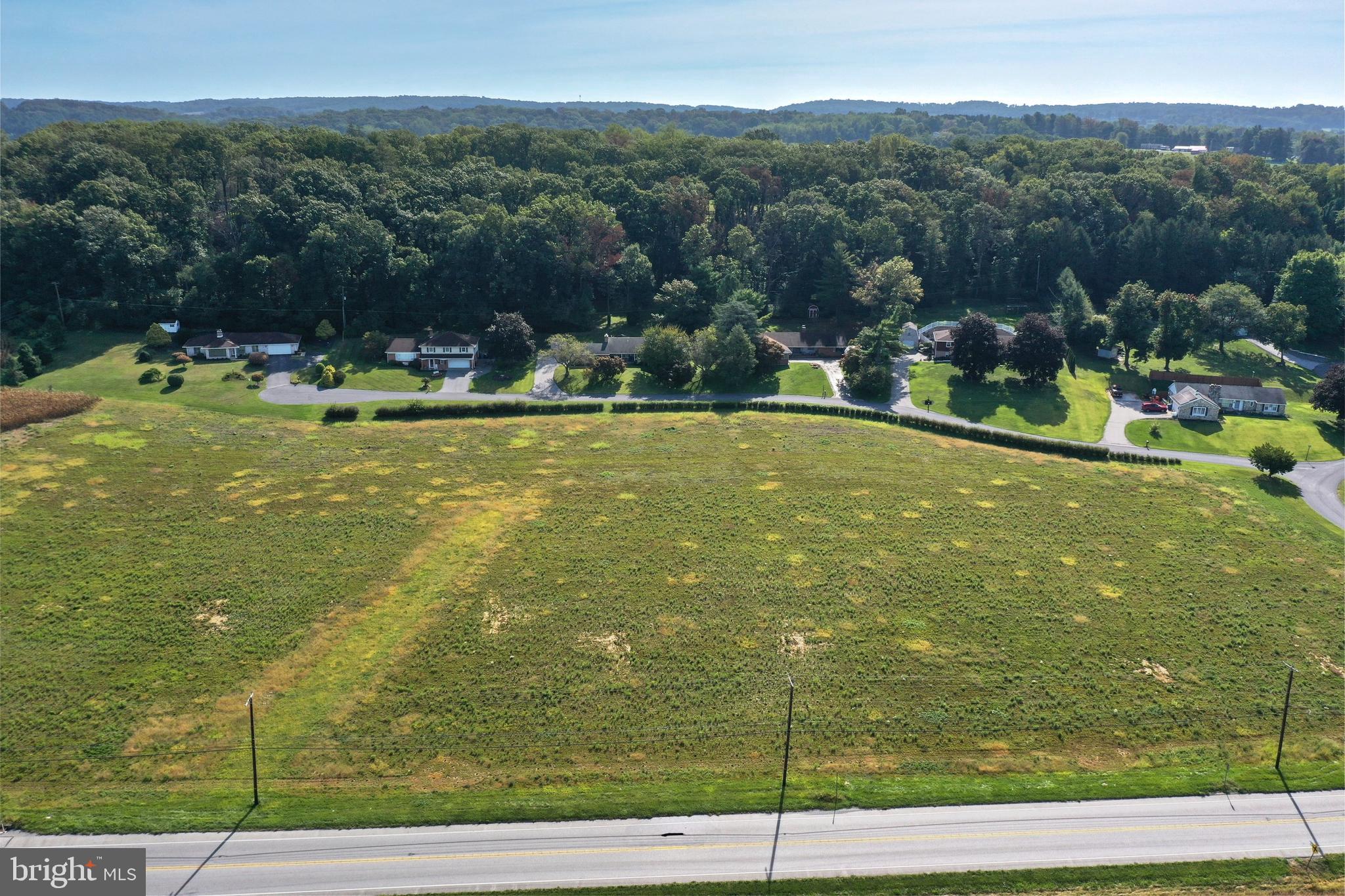 Lot #2 Midhill Road Spring Grove, PA 17362 - Photo 5 of 6 a view of a lake with houses