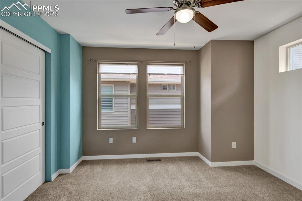 4118 Elegant Street Castle Rock, CO 80109 - Photo 18 of 26 a view of an empty room with a window