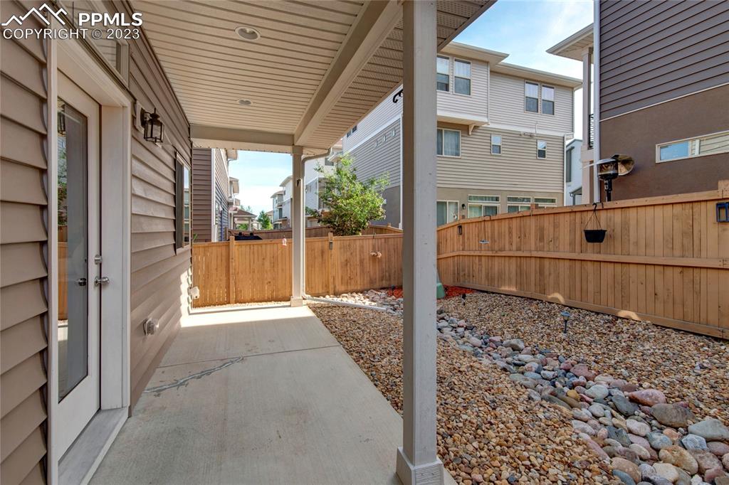 4118 Elegant Street Castle Rock, CO 80109 - Photo 22 of 26 a view of a pathway along a building