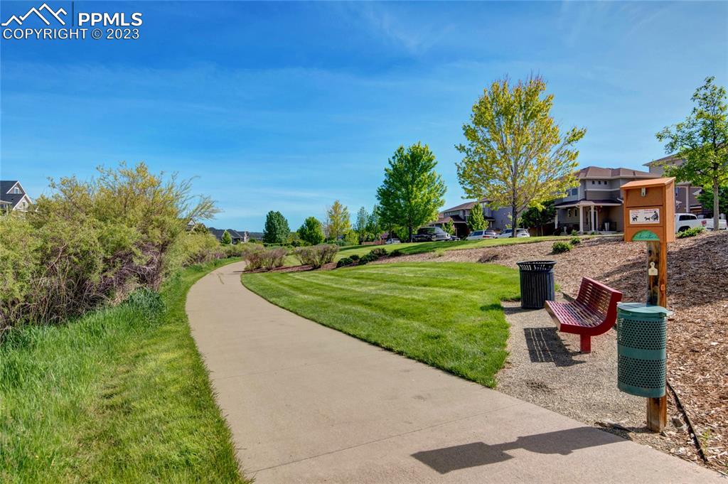 4118 Elegant Street Castle Rock, CO 80109 - Photo 24 of 26 a view of a house with a yard