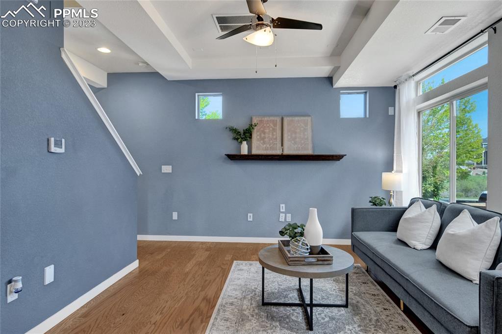 4118 Elegant Street Castle Rock, CO 80109 - Photo 7 of 26 a living room with furniture and a large window