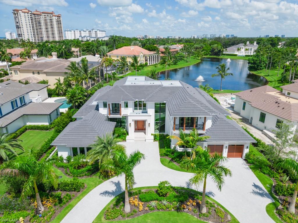 349 Colony Drive Naples, FL 34108 - Photo 2 of 48 Bird's eye view featuring a water view