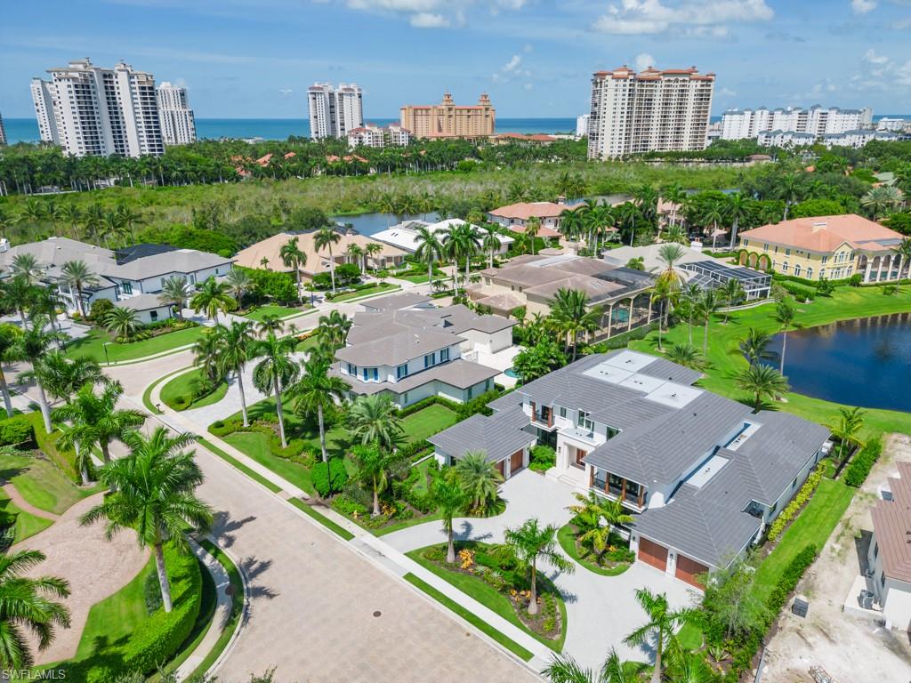 349 Colony Drive Naples, FL 34108 - Photo 6 of 48 Birds eye view of property featuring a water view