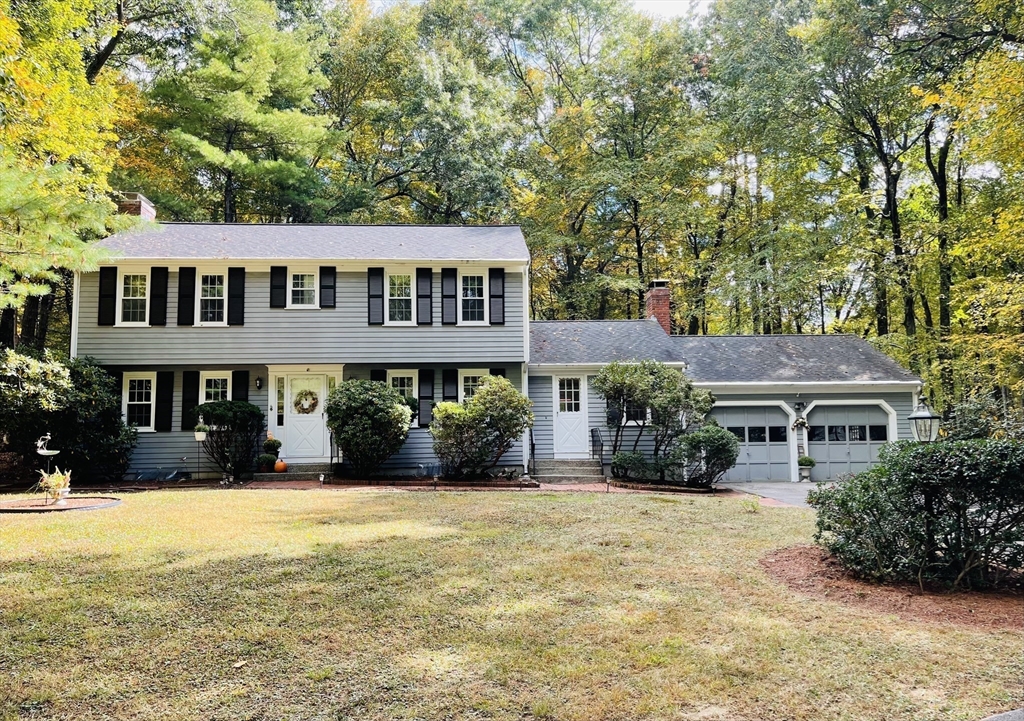 42 Jackson Drive Acton, MA 01720 - Photo 2 of 39 a front view of a house with a yard