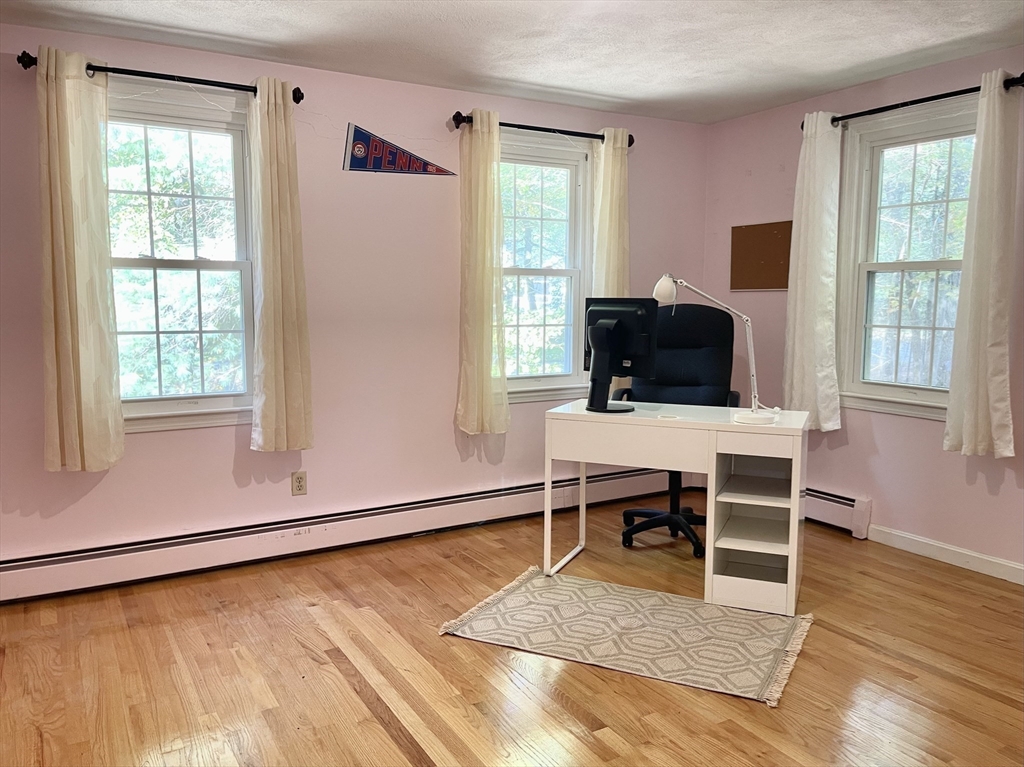 42 Jackson Drive Acton, MA 01720 - Photo 29 of 39 a livingroom with furniture and window