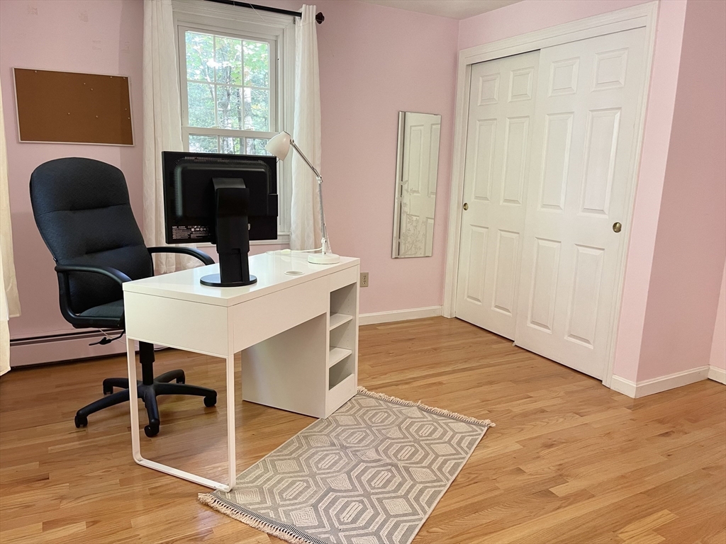 42 Jackson Drive Acton, MA 01720 - Photo 30 of 39 a view of a workspace with furniture and a window