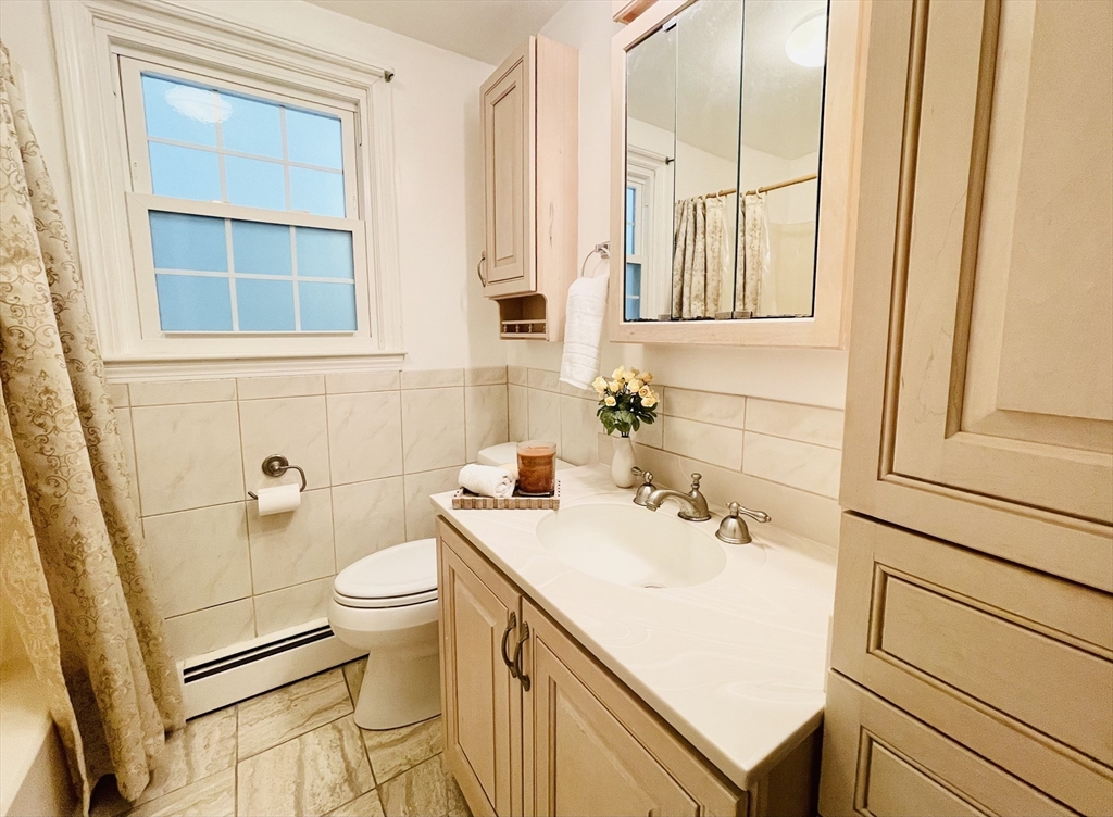 42 Jackson Drive Acton, MA 01720 - Photo 33 of 39 a bathroom with a sink toilet and shower