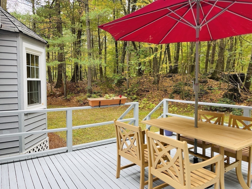 42 Jackson Drive Acton, MA 01720 - Photo 37 of 39 a view of a swimming pool with a patio