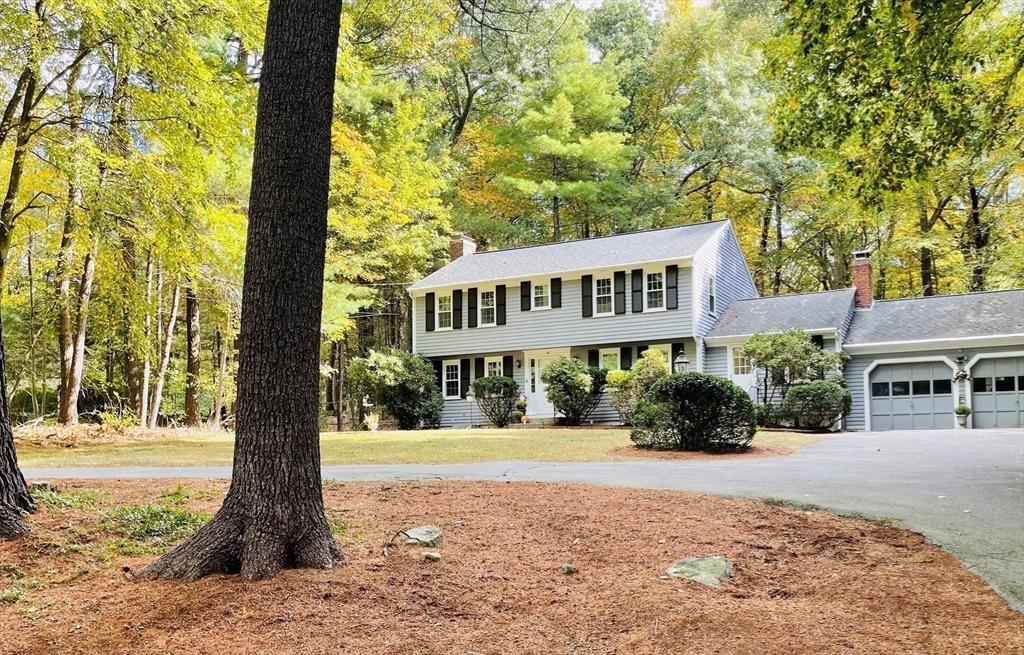 42 Jackson Drive Acton, MA 01720 - Photo 39 of 39 a sign board with yard in the back