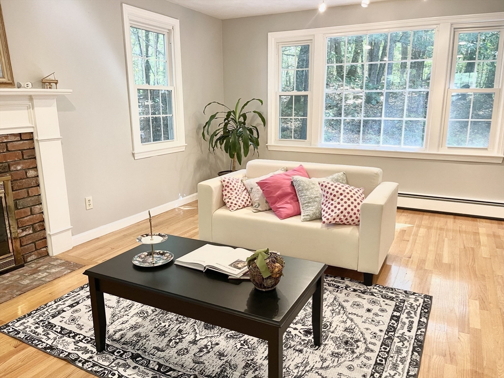 42 Jackson Drive Acton, MA 01720 - Photo 7 of 39 a view of a dining room with furniture and window