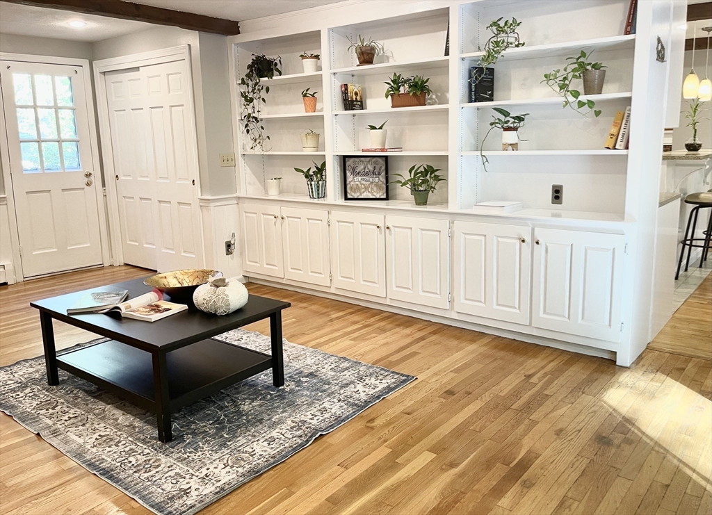 42 Jackson Drive Acton, MA 01720 - Photo 9 of 39 a living room with furniture