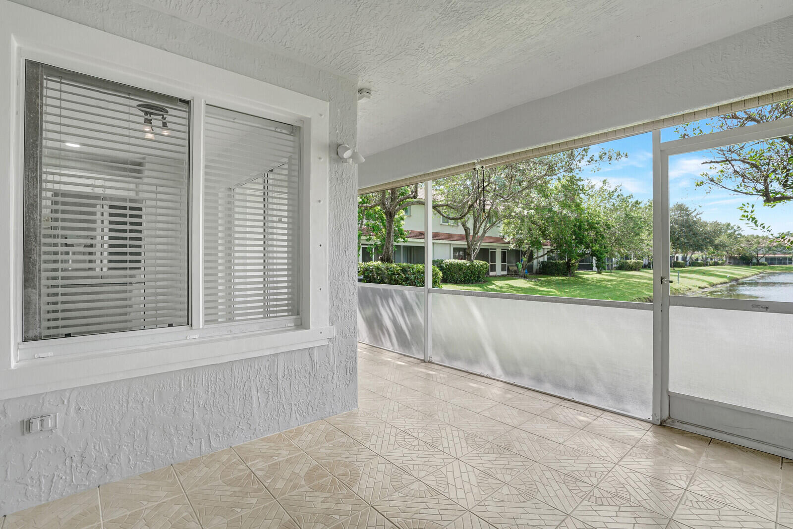 7117 Hawks Nest Terrace Riviera Beach, FL 33407 - Photo 17 of 22 Covered Patio