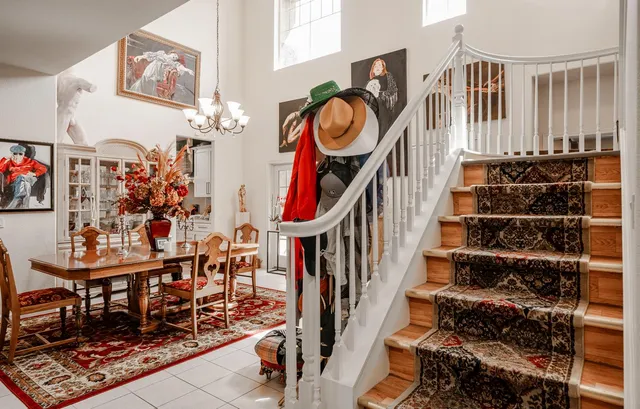 a view of an entryway with wooden floor