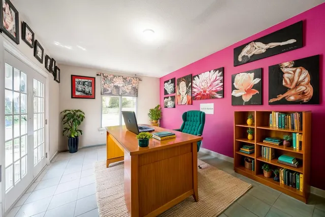 a view of a workspace with furniture and toys