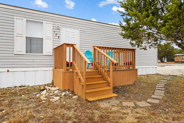 a view of entryway with wooden stairs