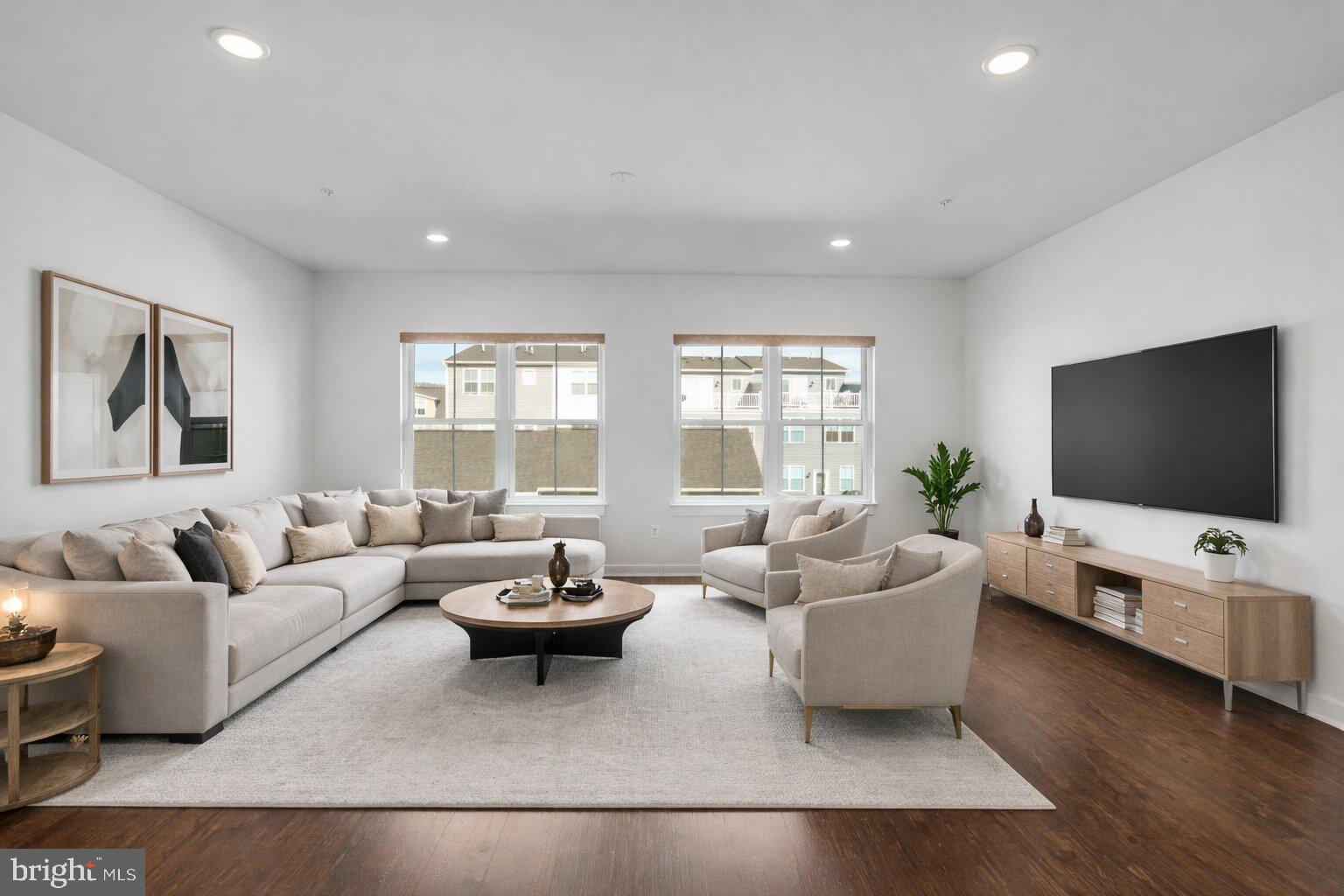 1203 Furgeson Lane Frederick, MD 21702 - Photo 2 of 16 a living room with furniture and a flat screen tv