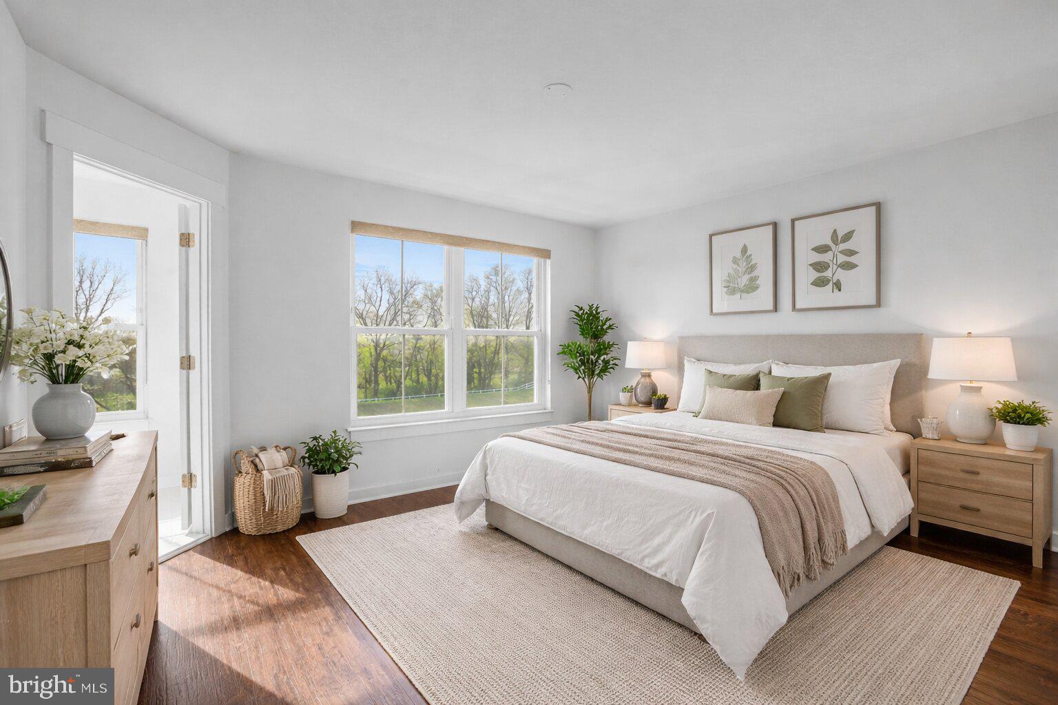 1203 Furgeson Lane Frederick, MD 21702 - Photo 4 of 16 a bedroom with a bed and a couch