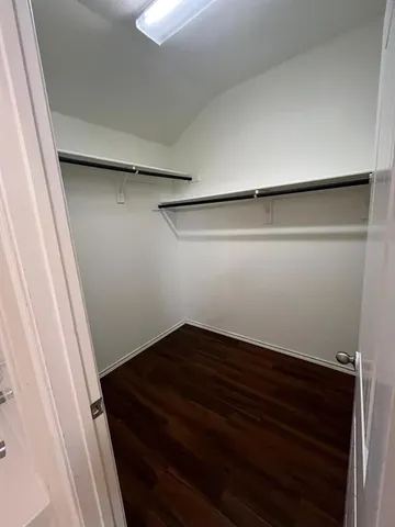 a bathroom with a bathtub and a toilet