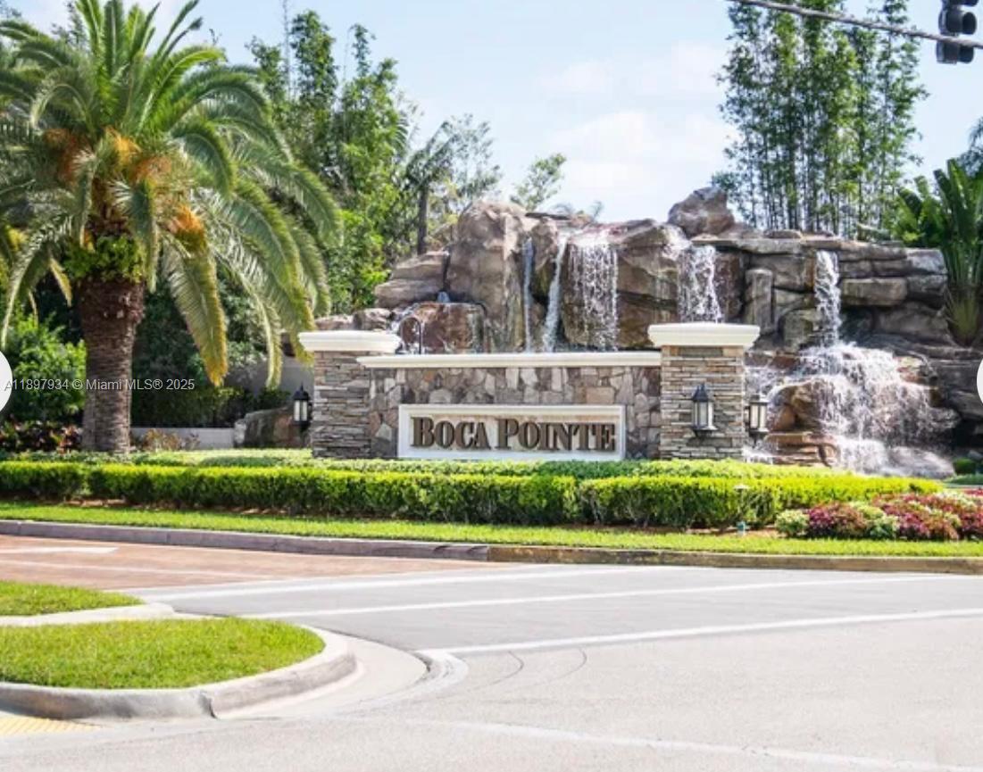 a view of a house with a swimming pool and a garden