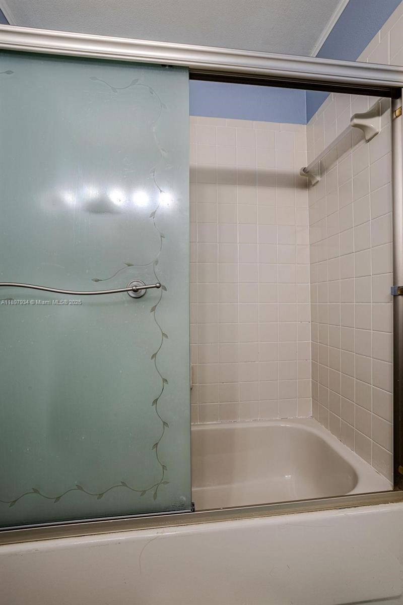 6500 Via Regina, Unit 8 Boca Raton, FL 33433 - Photo 15 of 31 a bathroom with a shower