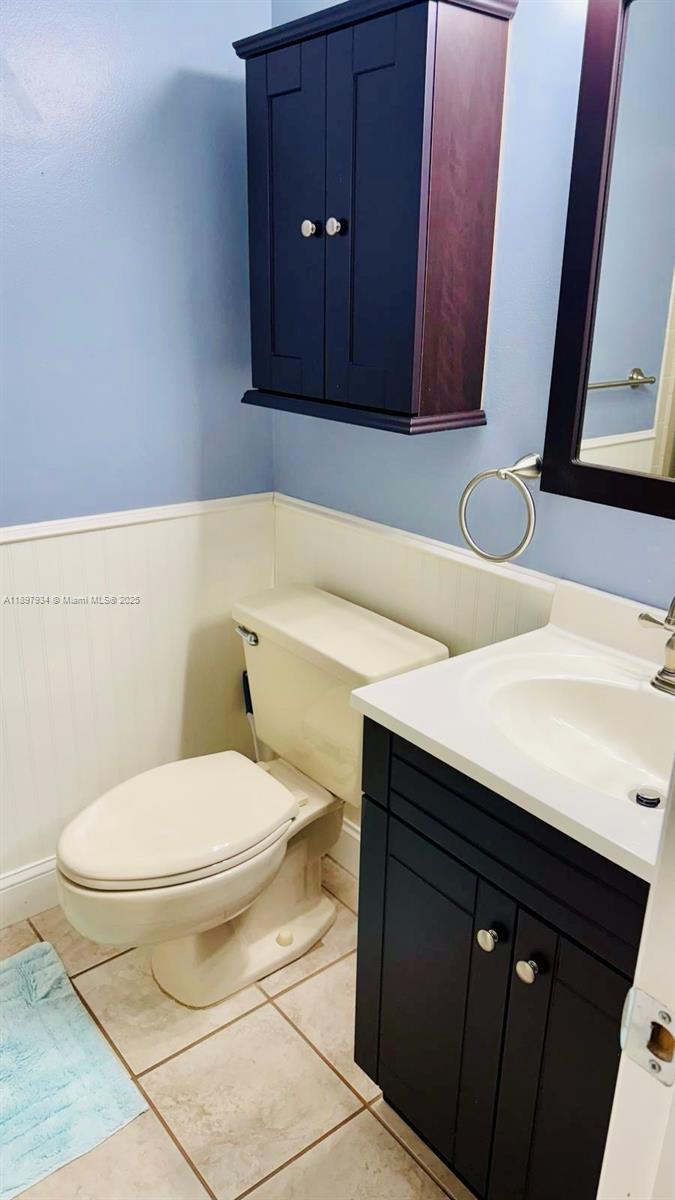 6500 Via Regina, Unit 8 Boca Raton, FL 33433 - Photo 17 of 31 a bathroom with a sink and a toilet