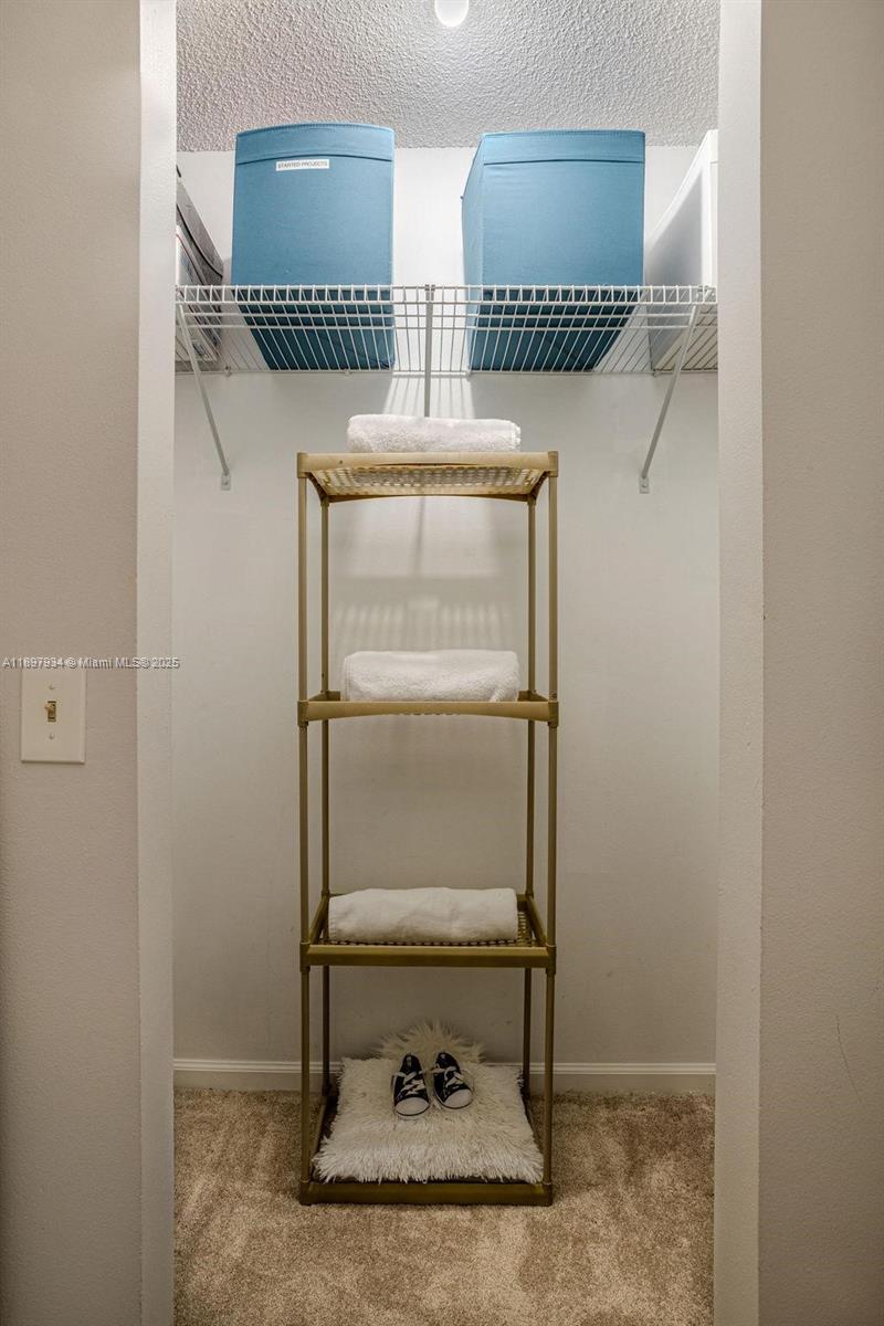 6500 Via Regina, Unit 8 Boca Raton, FL 33433 - Photo 19 of 31 a room with two washing machine