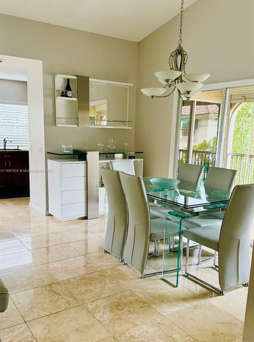 6500 Via Regina, Unit 8 Boca Raton, FL 33433 - Photo 21 of 31 a workspace with furniture and window