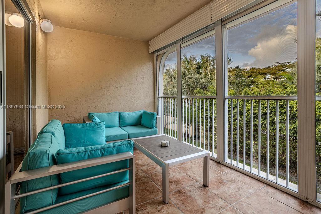6500 Via Regina, Unit 8 Boca Raton, FL 33433 - Photo 22 of 31 a outdoor living space with furniture