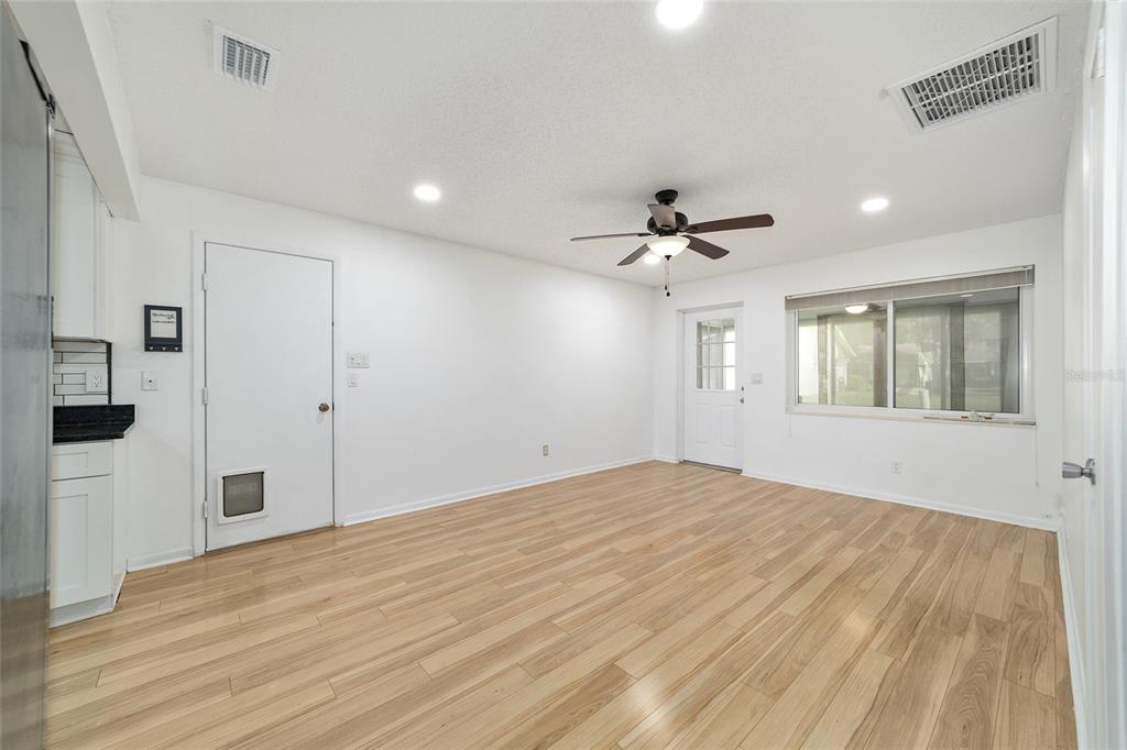 8877 Southwest 96th Street, Unit D Ocala, FL 34481 - Photo 20 of 51 a view of an empty room with a window