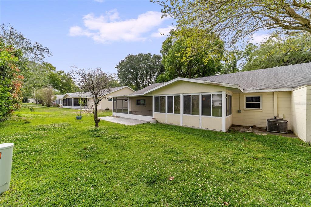 8877 Southwest 96th Street, Unit D Ocala, FL 34481 - Photo 51 of 51 a house view with a garden space