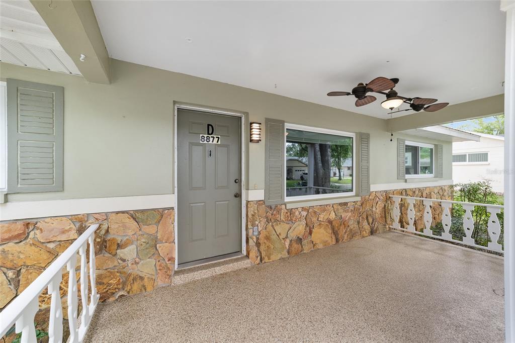 8877 Southwest 96th Street, Unit D Ocala, FL 34481 - Photo 8 of 51 a view of an entryway with wooden floor