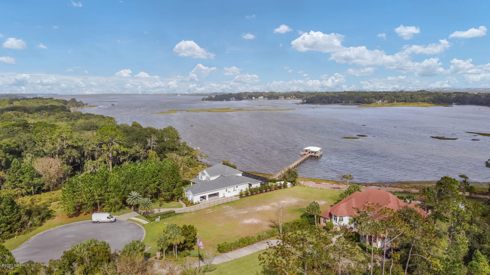 96278 Captains Pointe Road Yulee, FL 32097 - Photo 15 of 17 a view of a lake in between the ocean and trees