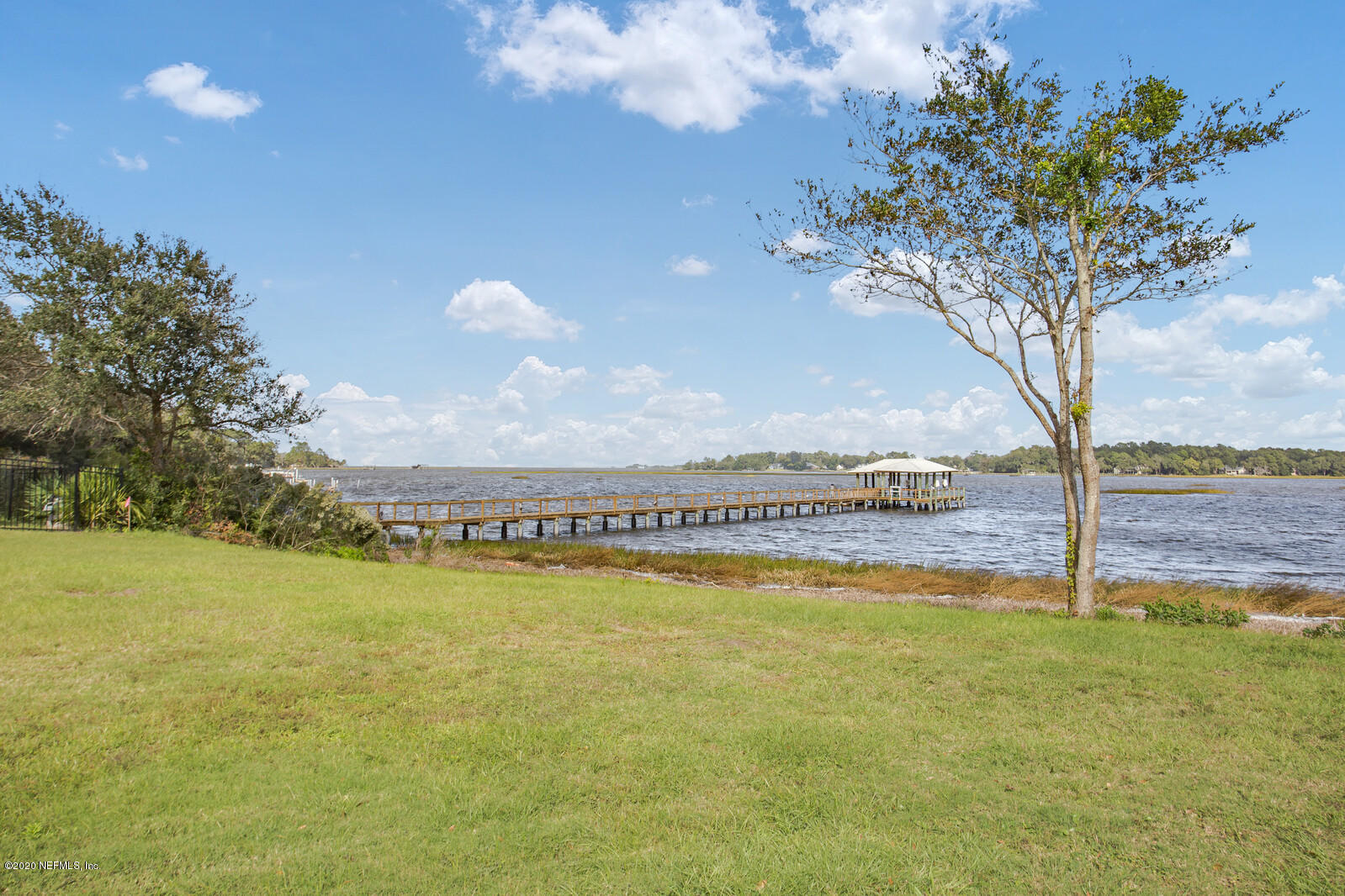 96278 Captains Pointe Road Yulee, FL 32097 - Photo 3 of 17 a view of a water fountain and a big yard