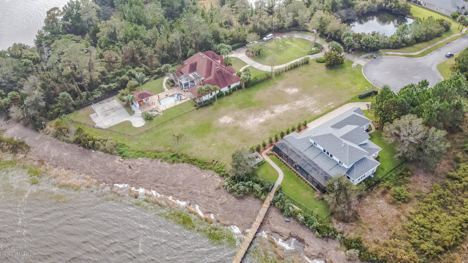 96278 Captains Pointe Road Yulee, FL 32097 - Photo 9 of 17 an aerial view of a house with a yard