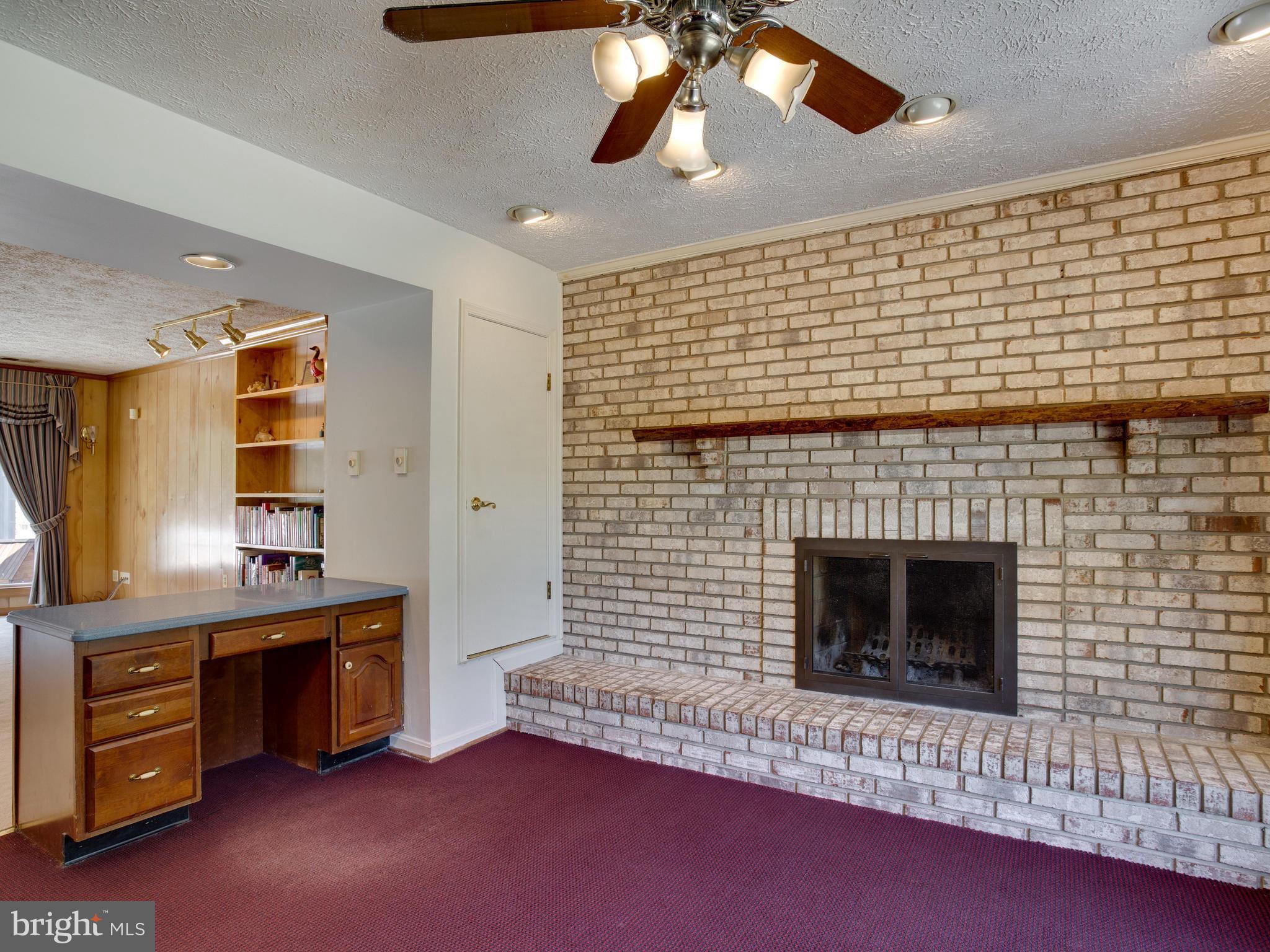 3060 Hickory Ridge Road Dunkirk, MD 20754 - Photo 15 of 29 Wood fireplace in the Kitchen