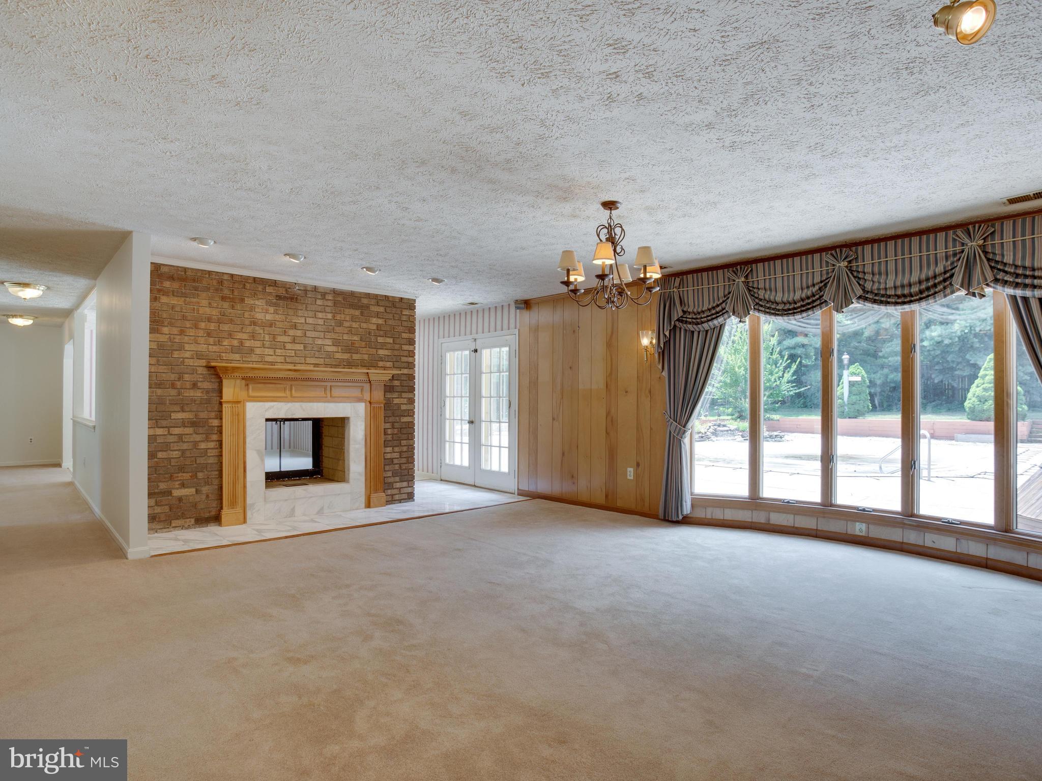 3060 Hickory Ridge Road Dunkirk, MD 20754 - Photo 17 of 29 Family room with two sided wood fireplace