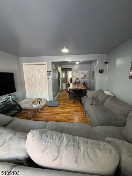 91 Spruce Street Newark, NJ 07102 - Photo 13 of 34 a living room with furniture