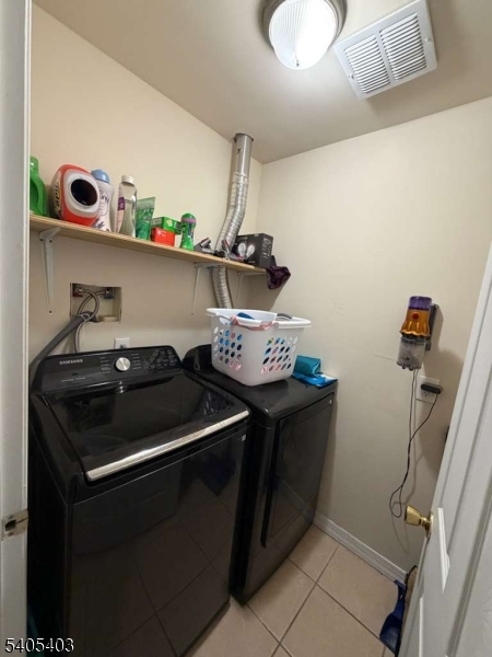 91 Spruce Street Newark, NJ 07102 - Photo 20 of 34 a kitchen with a sink and cabinets