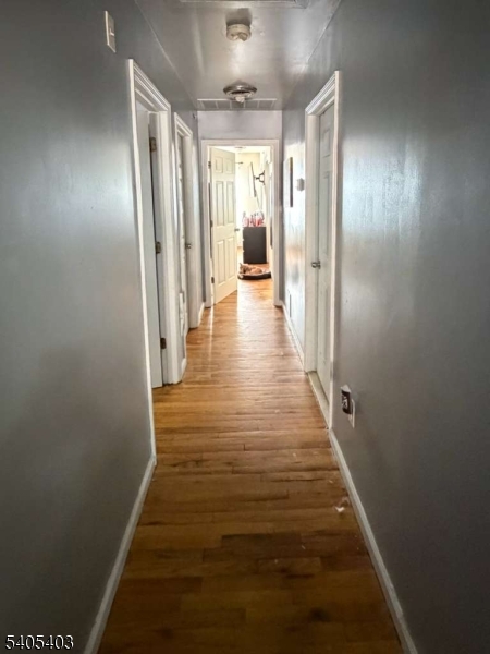 91 Spruce Street Newark, NJ 07102 - Photo 21 of 34 a view of gallery with wooden floor