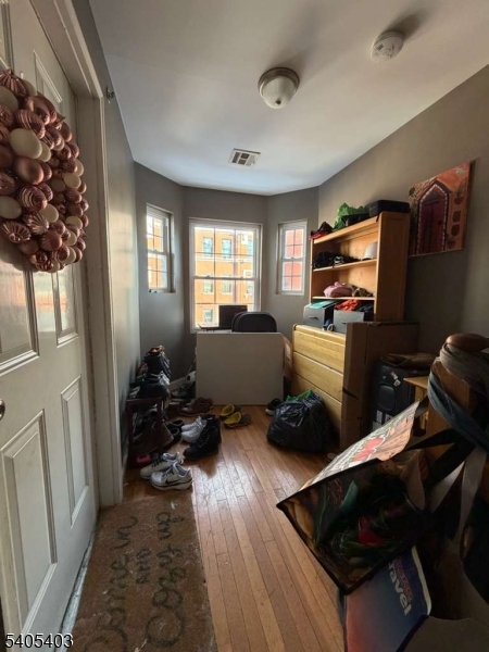91 Spruce Street Newark, NJ 07102 - Photo 9 of 34 a room with furniture a rug toys and a window