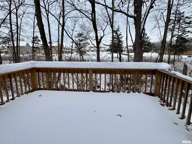 a view of a balcony with trees