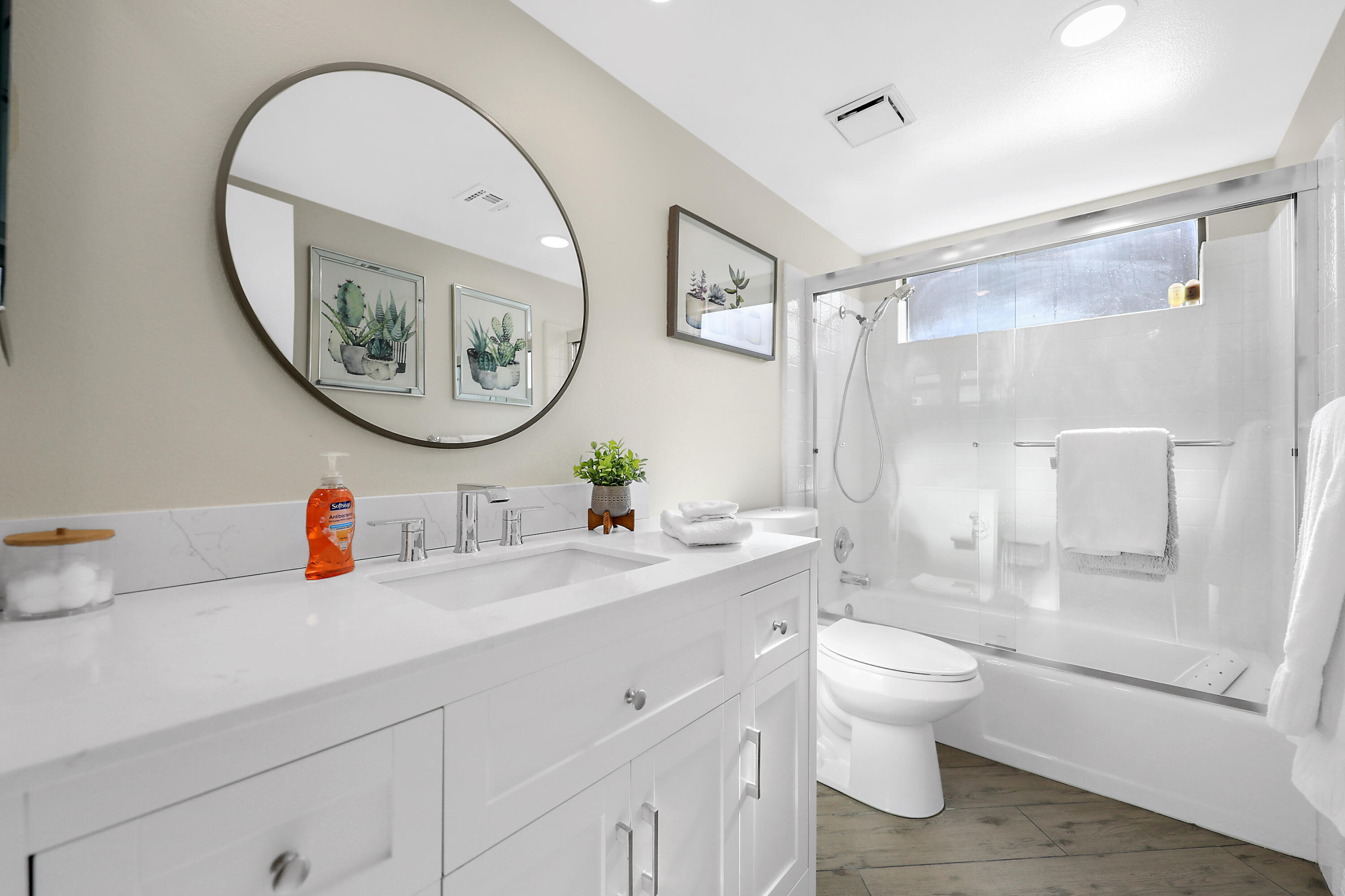 41542 Jupiter Hills Court Palm Desert, CA 92211 - Photo 14 of 29 a bathroom with a toilet a sink and a mirror