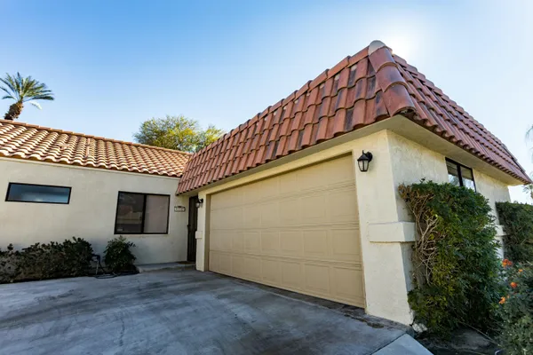 a view of a house with a garage