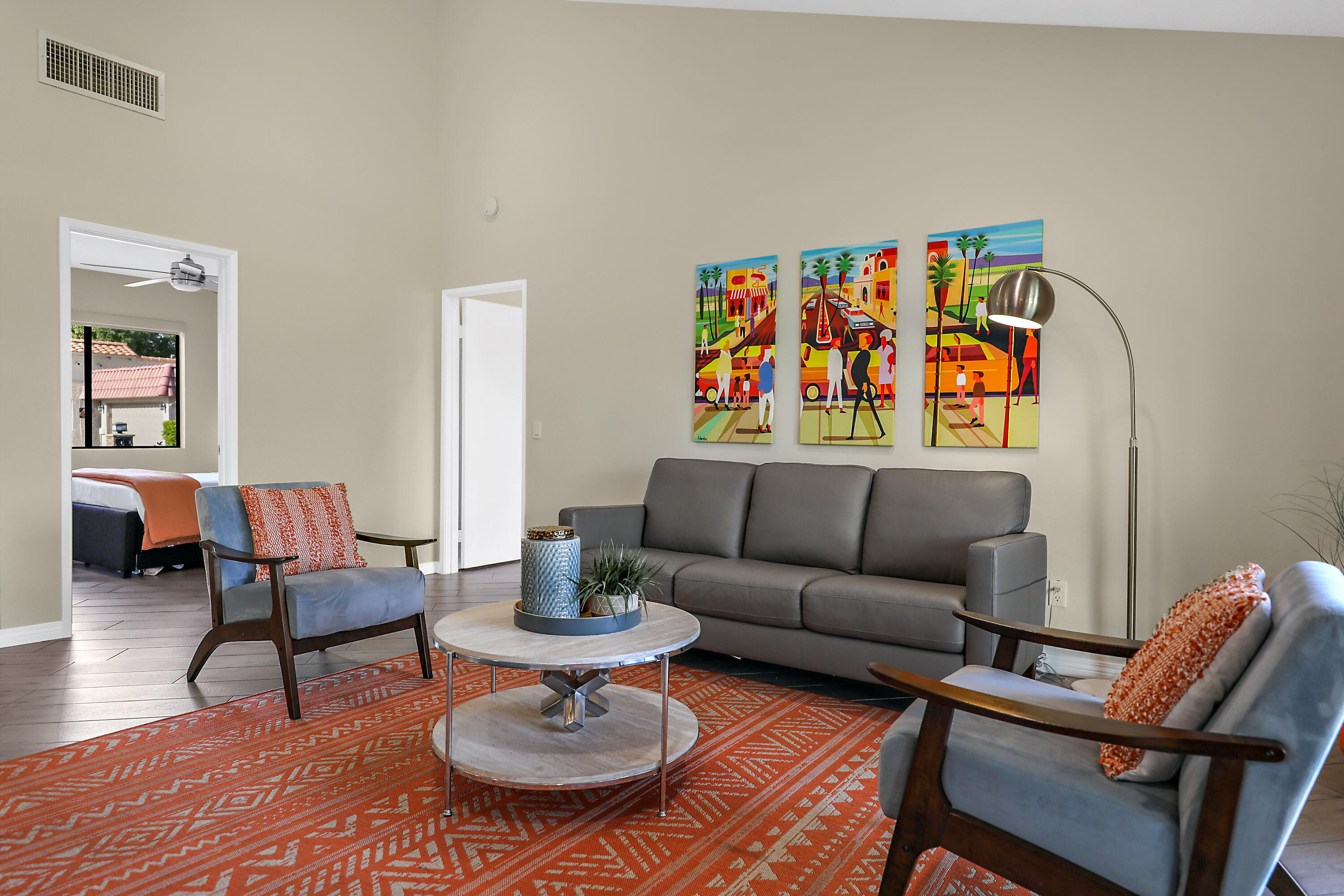 41542 Jupiter Hills Court Palm Desert, CA 92211 - Photo 5 of 29 a living room with furniture and wooden floor