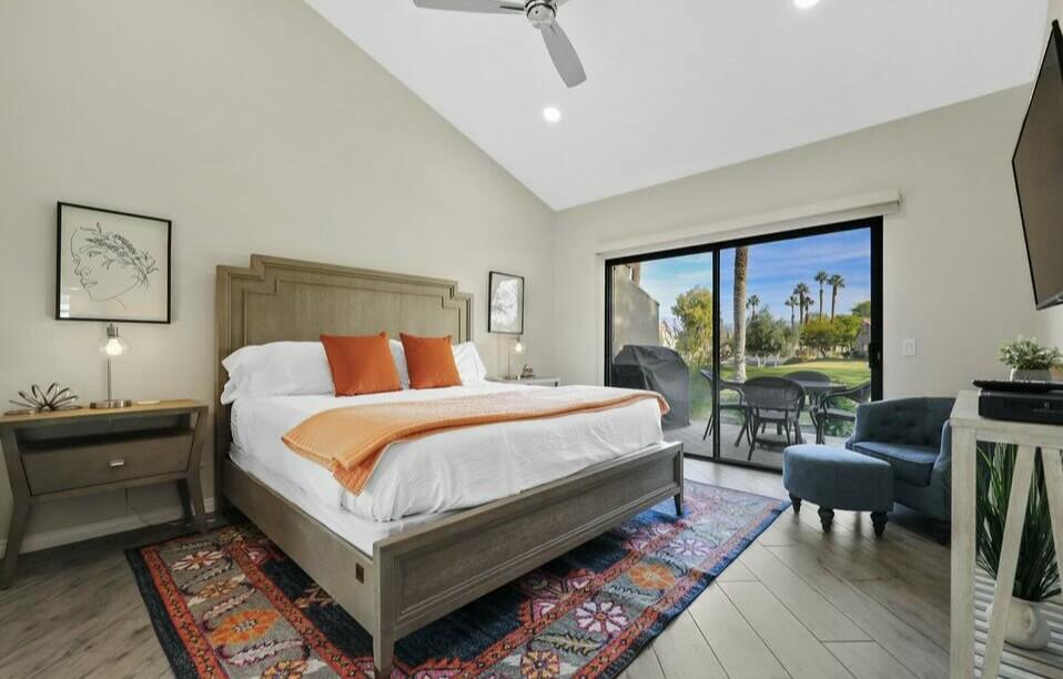 41542 Jupiter Hills Court Palm Desert, CA 92211 - Photo 9 of 29 a bed room with a bed and a desk