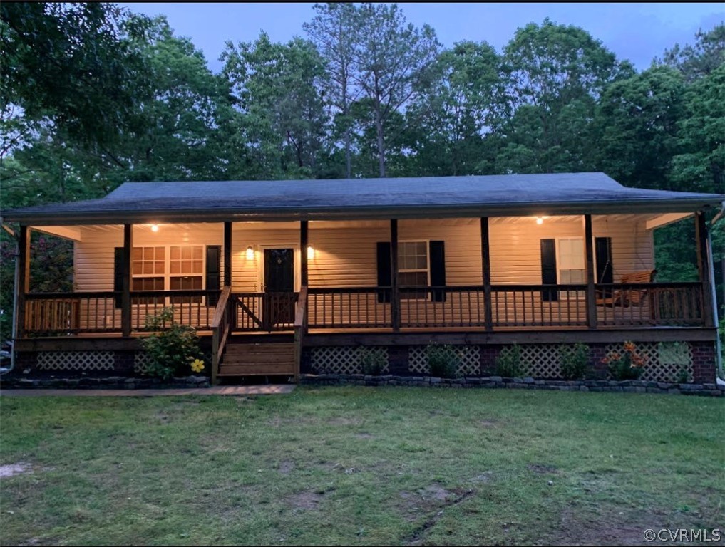 20394 Beaver Dam Road Beaverdam, VA 23015 - Photo 1 of 1 a view of a backyard with plants and a garden