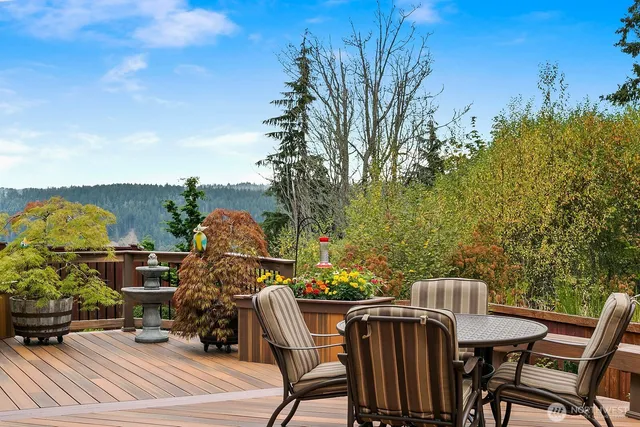 a view of a chairs and table on the terrace