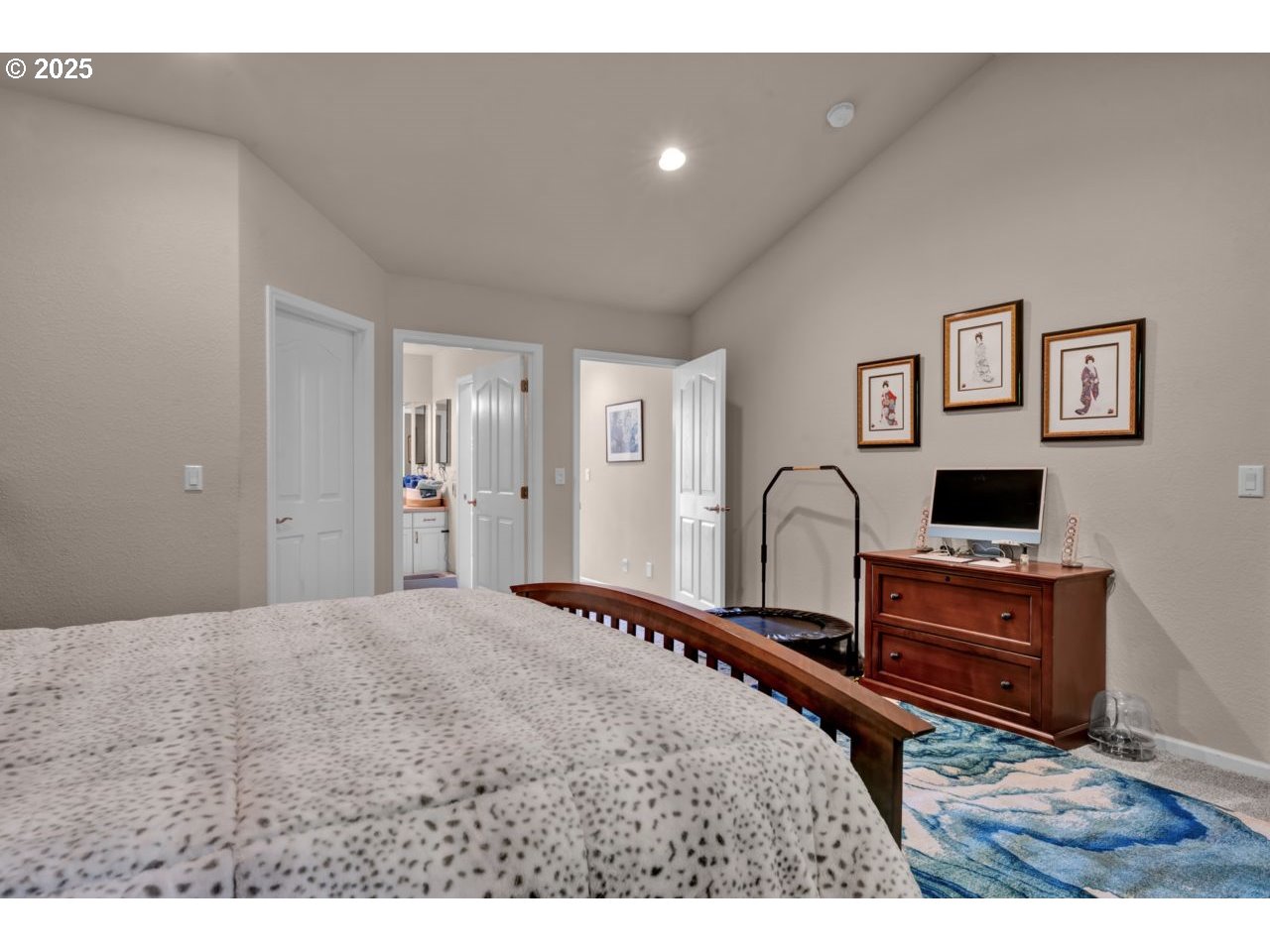 2131 Willow Loop Florence, OR 97439 - Photo 32 of 48 a bedroom with a bed and a desk